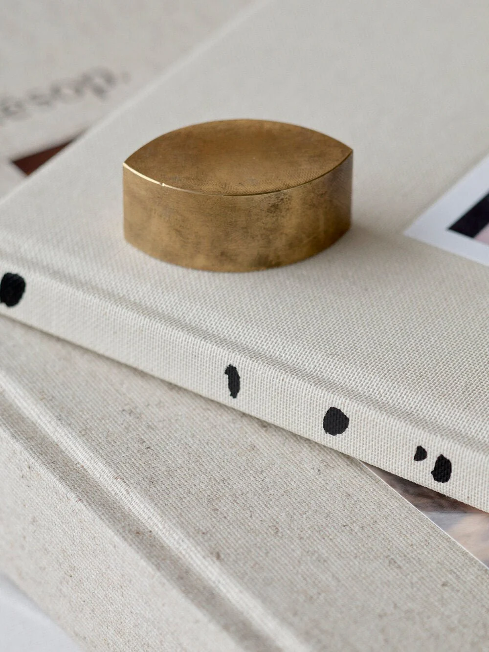 Signe Hytte Almond Book Weight: Brass - Image 6
